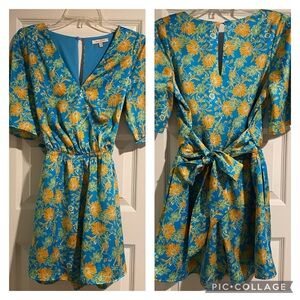 Skies are Blue. Super cute flowered shorts romper. Size XS